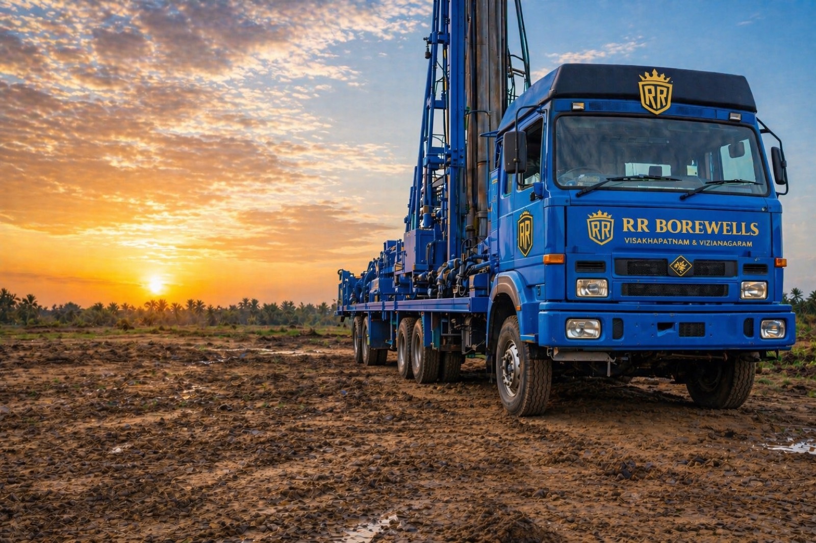 RR BOREWELLS premium drilling truck at sunrise